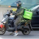 censo repartidores Rosario en moto realizando entregas por la ciudad