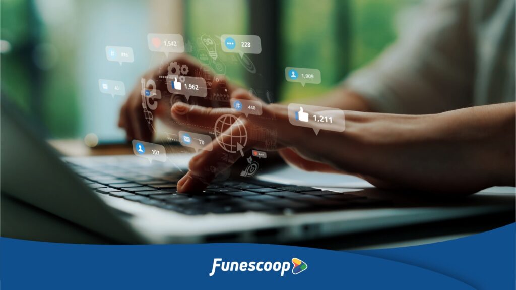 Fibra óptica en Funes: manos en una laptop con íconos de redes sociales y el logo de Funescoop