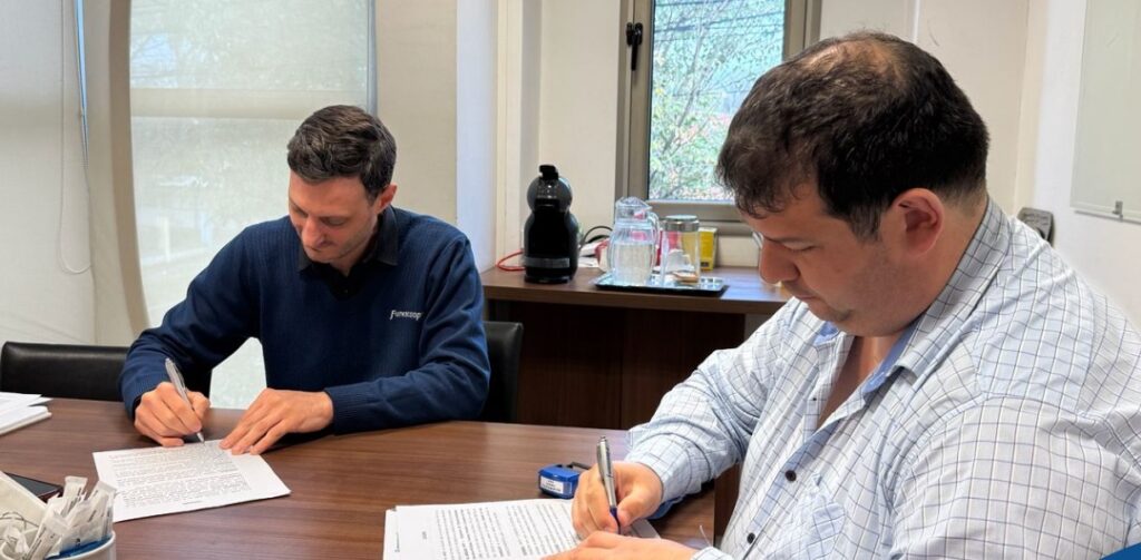 Firma del convenio entre Funescoop y ACIF